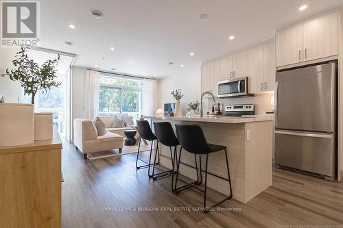 606 - 479 Charlton Avenue E, Hamilton (Stinson), ON - Indoor Photo Showing Kitchen With Stainless Steel Kitchen With Upgraded Kitchen