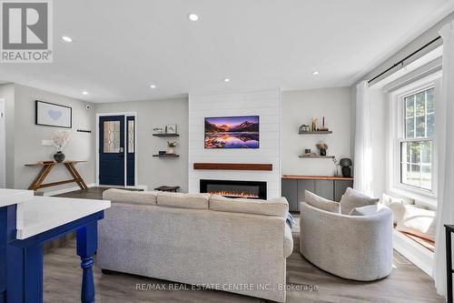 23 Ameer Drive, St. Catharines, ON - Indoor Photo Showing Living Room With Fireplace