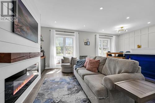 23 Ameer Drive, St. Catharines, ON - Indoor Photo Showing Living Room With Fireplace