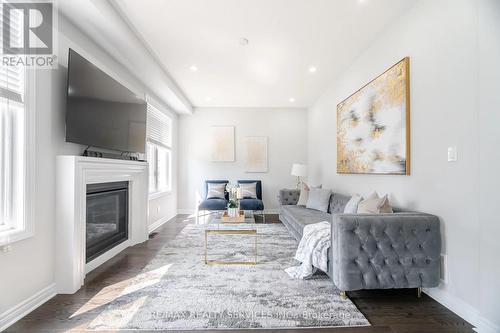 58 Russell Creek Drive, Brampton (Sandringham-Wellington North), ON - Indoor Photo Showing Living Room With Fireplace