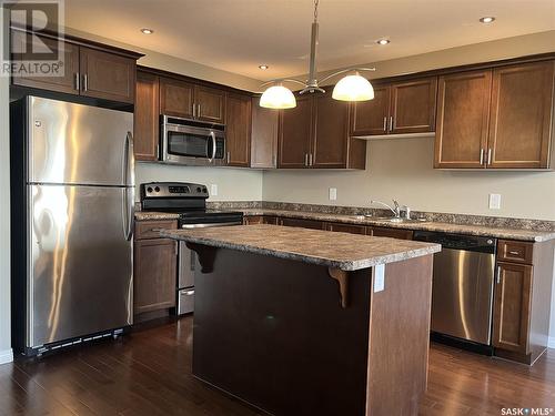 52 1600 Muzzy Drive, Prince Albert, SK - Indoor Photo Showing Kitchen With Stainless Steel Kitchen