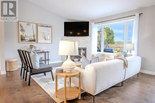 484 Ennis Road, Smith-Ennismore-Lakefield, ON - Indoor Photo Showing Living Room With Fireplace