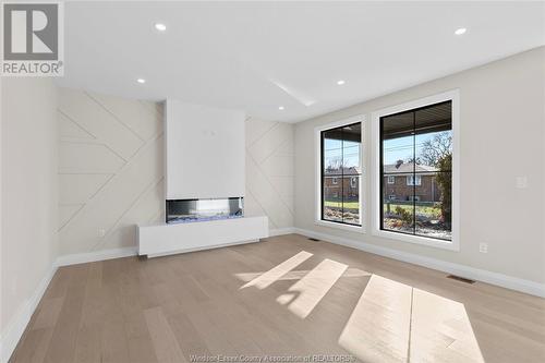 319 Ruth, Essex, ON - Indoor Photo Showing Other Room With Fireplace