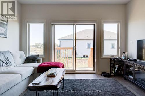 84 Cheryl Avenue, North Perth, ON - Indoor Photo Showing Living Room