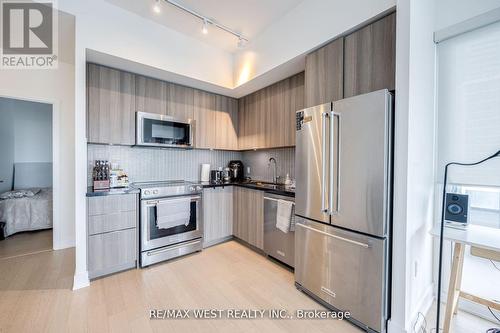 702 - 20 Shore Breeze Drive, Toronto (Mimico), ON - Indoor Photo Showing Kitchen