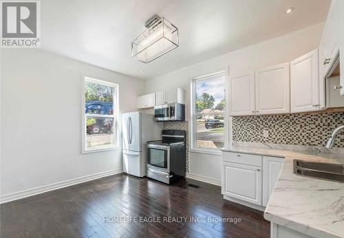 #Main - 87 Simcoe Road, Bradford West Gwillimbury, ON - Indoor Photo Showing Kitchen With Double Sink