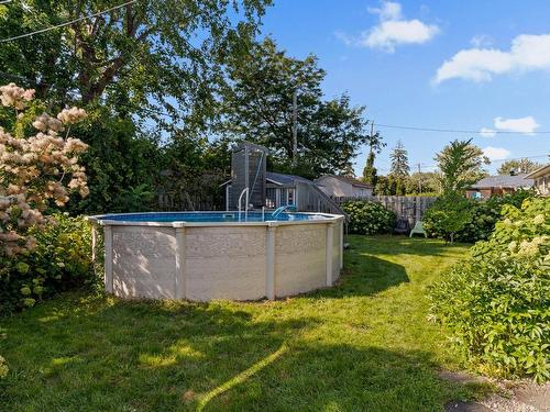 Pool - 5810 Rue Villiers, Brossard, QC - Outdoor With Above Ground Pool With Backyard