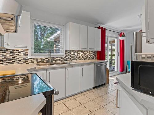 Kitchen - 5810 Rue Villiers, Brossard, QC - Indoor Photo Showing Kitchen With Double Sink