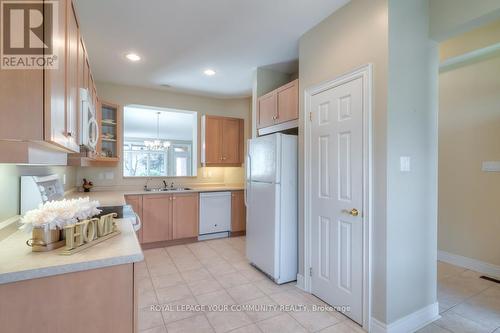 22 Faldos Flight, Whitchurch-Stouffville (Ballantrae), ON - Indoor Photo Showing Kitchen With Double Sink