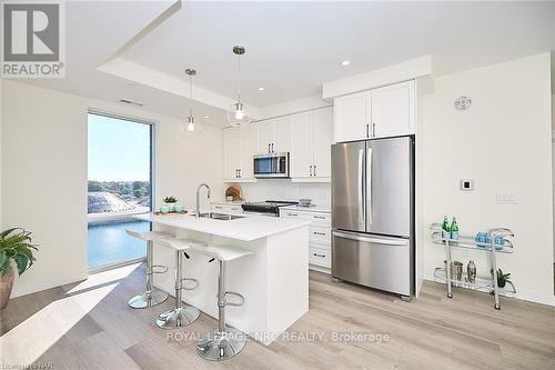 606 - 118 West Street, Port Colborne, ON - Indoor Photo Showing Kitchen With Stainless Steel Kitchen With Double Sink With Upgraded Kitchen