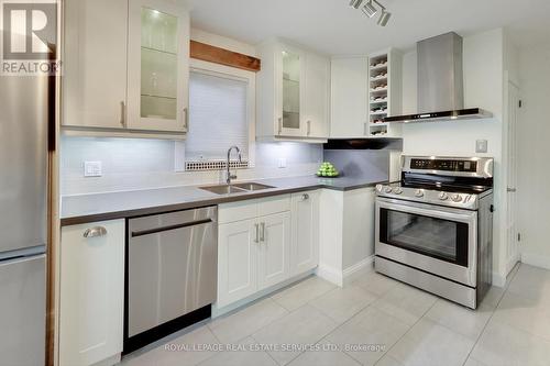 130 Wesley Street, Toronto (Stonegate-Queensway), ON - Indoor Photo Showing Kitchen With Double Sink