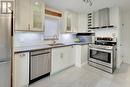 130 Wesley Street, Toronto (Stonegate-Queensway), ON  - Indoor Photo Showing Kitchen With Double Sink 