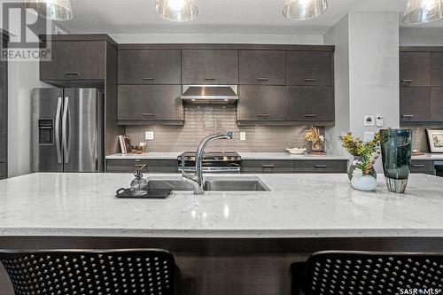 522A 6Th Street E, Saskatoon, SK - Indoor Photo Showing Kitchen With Stainless Steel Kitchen With Double Sink With Upgraded Kitchen