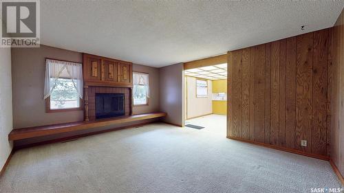 64 Cameron Crescent, Regina, SK - Indoor With Fireplace