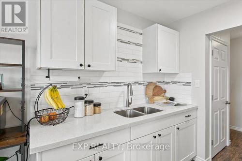 108 - 120 Nonquon Road, Oshawa (Centennial), ON - Indoor Photo Showing Kitchen With Double Sink