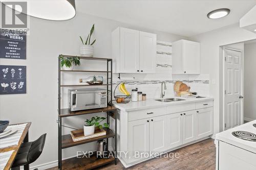 108 - 120 Nonquon Road, Oshawa (Centennial), ON - Indoor Photo Showing Kitchen With Double Sink