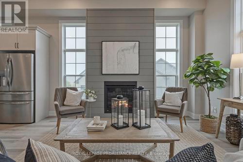 705 Wilkins Gate, Cobourg, ON - Indoor Photo Showing Living Room With Fireplace