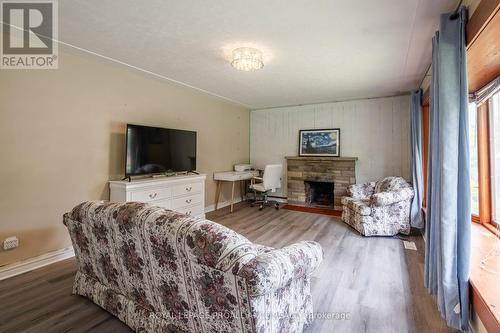 310 Arrowhead Place, Kingston, ON - Indoor Photo Showing Living Room With Fireplace