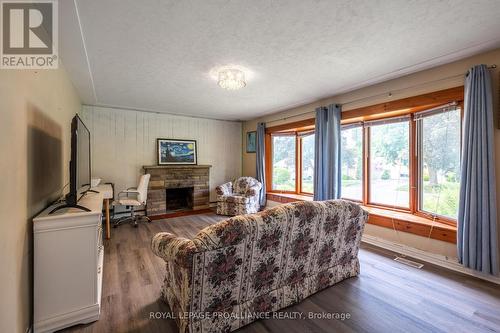 310 Arrowhead Place, Kingston, ON - Indoor Photo Showing Living Room With Fireplace