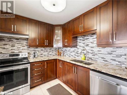 200 Robert Speck Parkway Unit# 602, Mississauga, ON - Indoor Photo Showing Kitchen With Stainless Steel Kitchen With Double Sink With Upgraded Kitchen