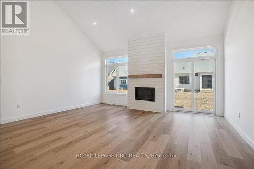 46 Beachwalk Crescent, Fort Erie, ON - Indoor Photo Showing Other Room With Fireplace