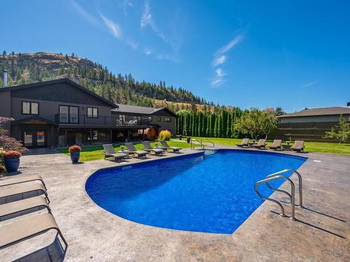 595 Durango Drive, Kamloops, BC - Outdoor With In Ground Pool With Deck Patio Veranda