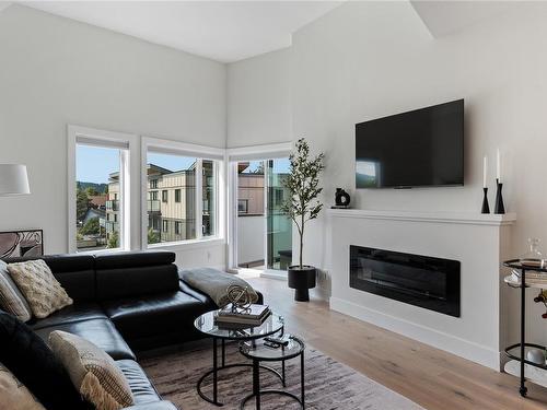 205-7098 Wallace Dr, Central Saanich, BC - Indoor Photo Showing Living Room With Fireplace