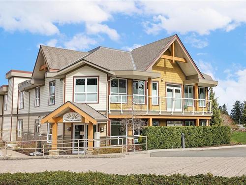 205-439 College Rd, Qualicum Beach, BC - Outdoor With Facade