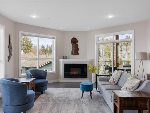 205-439 College Rd, Qualicum Beach, BC - Indoor Photo Showing Living Room With Fireplace