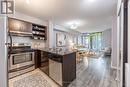 209 - 120 Dallimore Circle, Toronto (Banbury-Don Mills), ON  - Indoor Photo Showing Kitchen With Stainless Steel Kitchen With Double Sink 