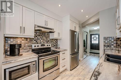 27 - 2088 Leanne Boulevard, Mississauga (Sheridan), ON - Indoor Photo Showing Kitchen With Upgraded Kitchen