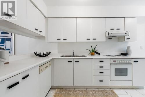 62 St Nicholas Street, Toronto (Bay Street Corridor), ON - Indoor Photo Showing Kitchen With Double Sink