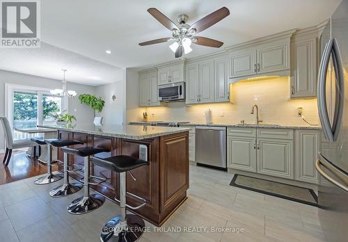 Large island with seating for four - 141 - 1500 Richmond Street, London, ON - Indoor Photo Showing Kitchen With Stainless Steel Kitchen With Upgraded Kitchen