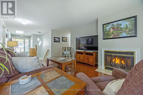 Bright and Spacious Main Floor Living Room - 141 - 1500 Richmond Street, London, ON - Indoor Photo Showing Living Room With Fireplace