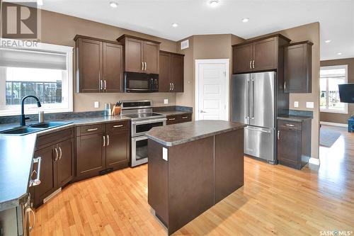 227 Padget Crescent, Saskatoon, SK - Indoor Photo Showing Kitchen With Stainless Steel Kitchen With Double Sink