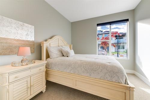 450 Windhover Court, Kelowna, BC - Indoor Photo Showing Living Room With Fireplace