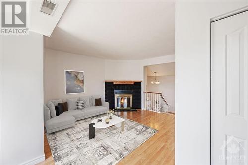 209C Woodfield Drive, Ottawa, ON - Indoor Photo Showing Living Room With Fireplace