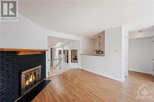 209C Woodfield Drive, Ottawa, ON - Indoor Photo Showing Living Room With Fireplace