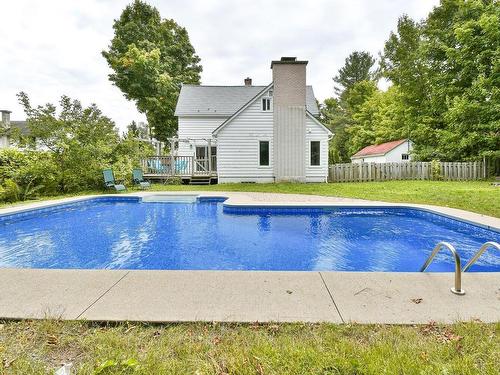 Piscine - 11 Rue St-Paul O., Sainte-Agathe-Des-Monts, QC - Outdoor With In Ground Pool With Backyard