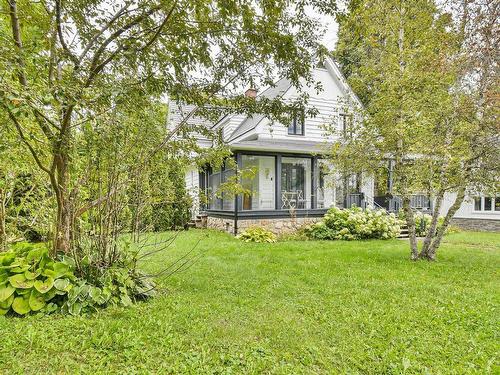 FaÃ§ade - 11 Rue St-Paul O., Sainte-Agathe-Des-Monts, QC - Outdoor With Deck Patio Veranda