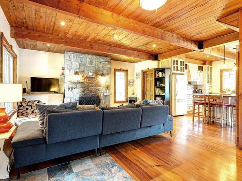 Salon - 160 53E Rue, Saint-Côme, QC - Indoor Photo Showing Living Room With Fireplace