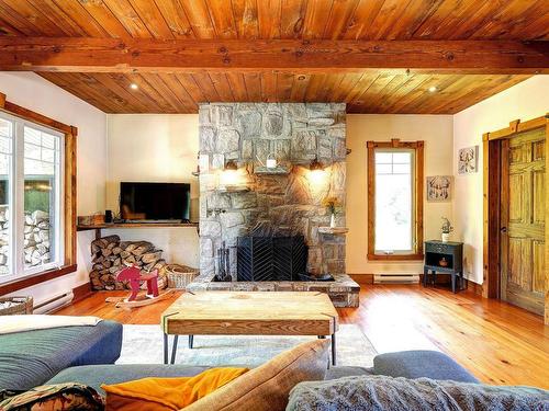 Salon - 160 53E Rue, Saint-Côme, QC - Indoor Photo Showing Living Room With Fireplace