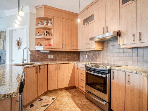 Cuisine - 303-1101 Boul. Lucille-Teasdale, Terrebonne (Lachenaie), QC - Indoor Photo Showing Kitchen With Upgraded Kitchen