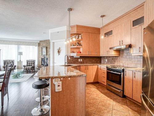 Cuisine - 303-1101 Boul. Lucille-Teasdale, Terrebonne (Lachenaie), QC - Indoor Photo Showing Kitchen