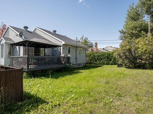 Back facade - 805 Rue Malraux, Laval (Sainte-Dorothée), QC - Outdoor With Deck Patio Veranda