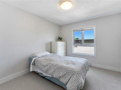 304-2515 Dowler Pl, Victoria, BC - Indoor Photo Showing Bedroom