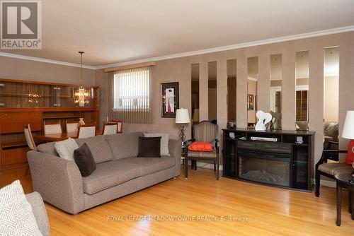 98 Silverstone Drive, Toronto (Mount Olive-Silverstone-Jamestown), ON - Indoor Photo Showing Living Room With Fireplace