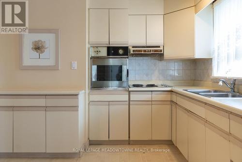 98 Silverstone Drive, Toronto (Mount Olive-Silverstone-Jamestown), ON - Indoor Photo Showing Kitchen With Double Sink