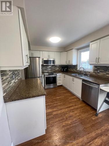 65 Clayton Crescent, Clarington (Bowmanville), ON - Indoor Photo Showing Kitchen With Double Sink