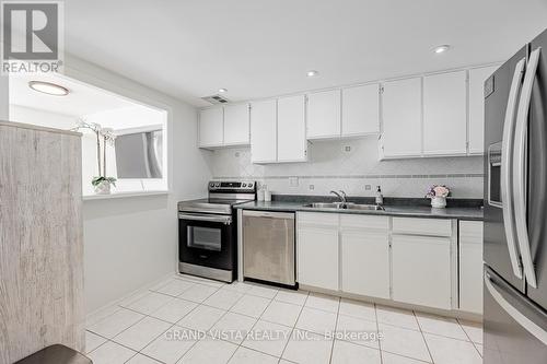 905 - 10 Dean Park Road, Toronto (Rouge), ON - Indoor Photo Showing Kitchen With Double Sink